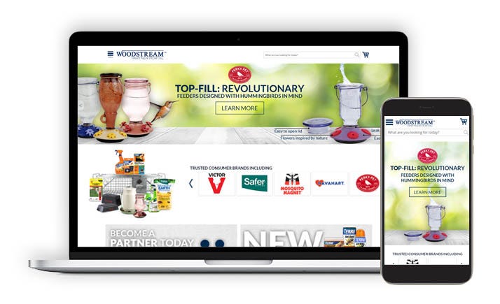 Laptop and mobile phone showing the Woodstream Partner Portal Website